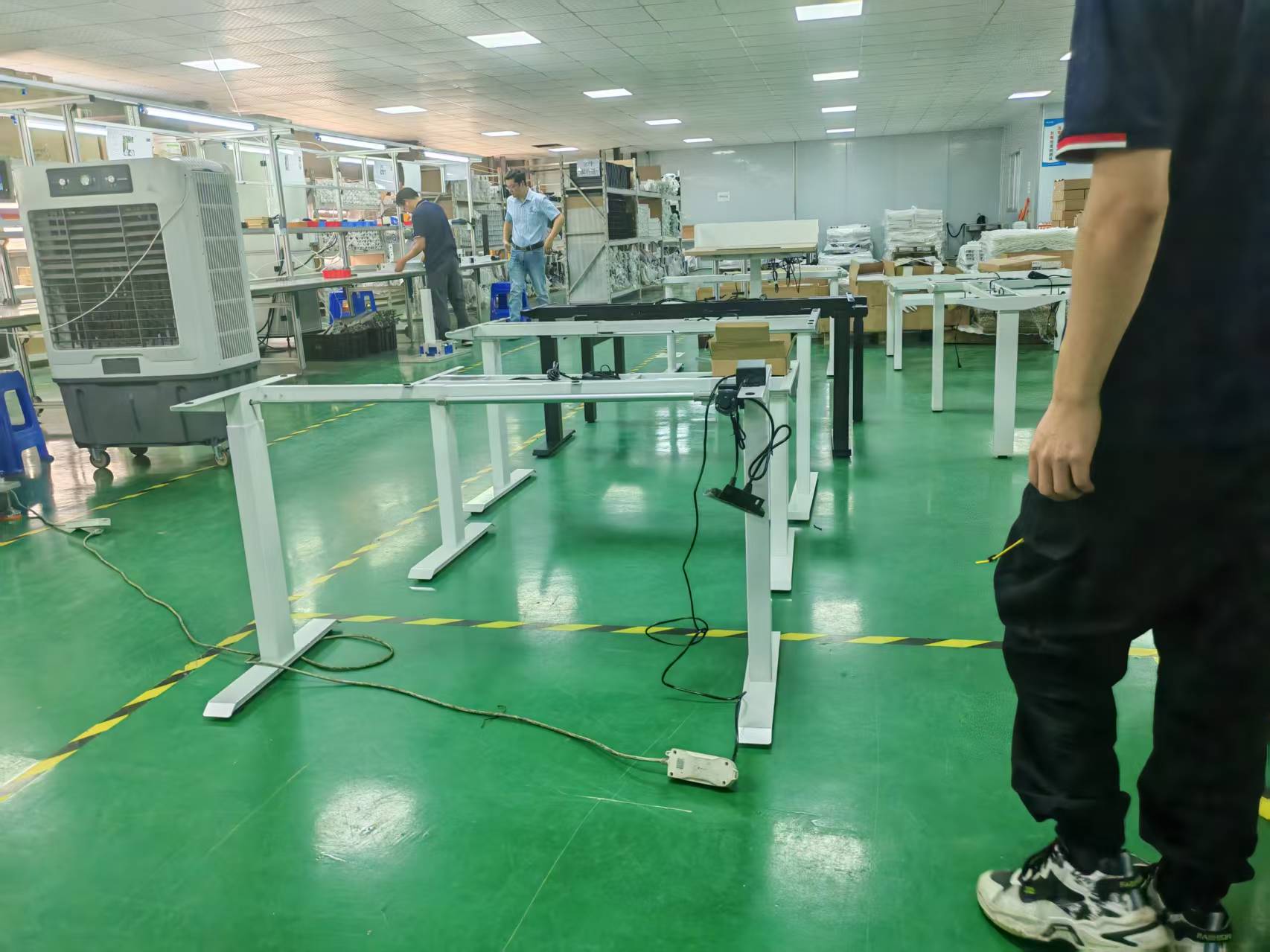 Precíziós mozgás: Miért biztosítják a Huagang elektromos állóasztalkeretek a stabilitást?